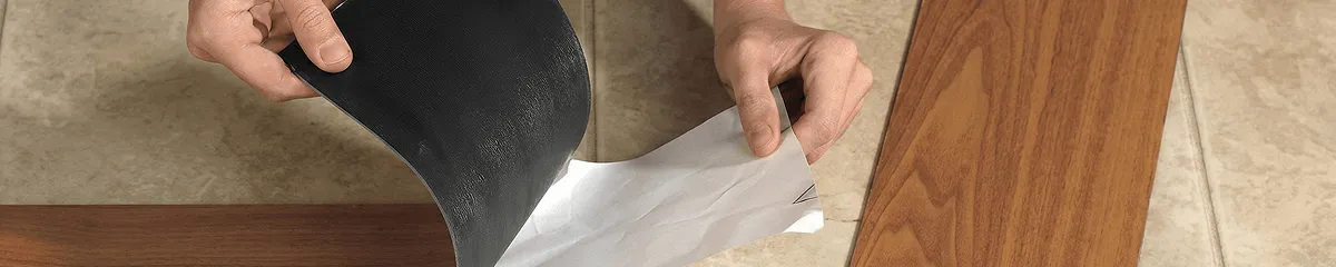 A professional installing vinyl flooring in Las Vegas, NV